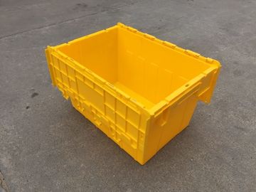 Желтые пластиковые бункеры прикрепили штабелированные крышки для транспорта
